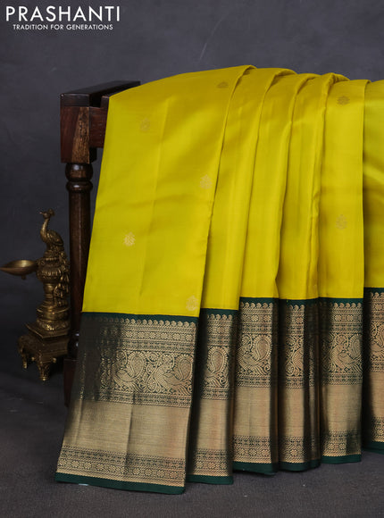 Pure kanchipuram silk saree lime yellow and dark green with zari woven buttas and long zari woven korvai border