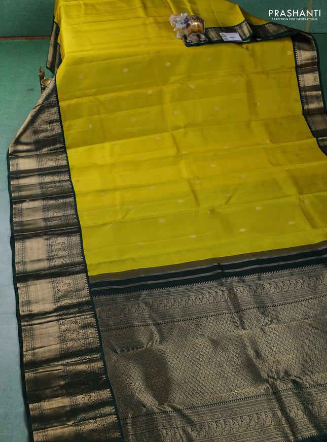 Pure kanchipuram silk saree lime yellow and dark green with zari woven buttas and long zari woven korvai border