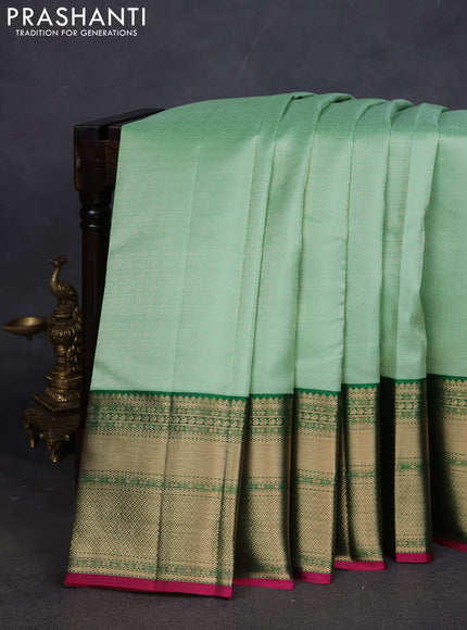 Pure kanchipuram silk saree teal green and dark green with allover zari woven brocade weaves and long zari woven korvai border
