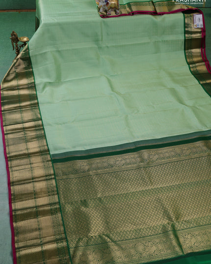 Pure kanchipuram silk saree teal green and dark green with allover zari woven brocade weaves and long zari woven korvai border