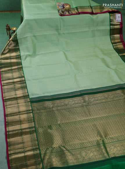 Pure kanchipuram silk saree teal green and dark green with allover zari woven brocade weaves and long zari woven korvai border