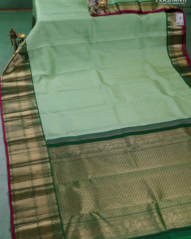 Pure kanchipuram silk saree teal green and dark green with allover zari woven brocade weaves and long zari woven korvai border