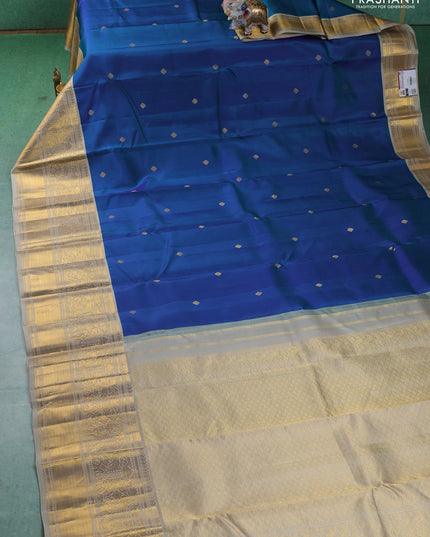 Pure kanchipuram silk saree blue and beige with zari woven buttas and zari woven korvai border