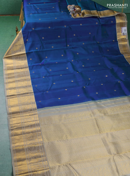 Pure kanchipuram silk saree blue and beige with zari woven buttas and zari woven korvai border