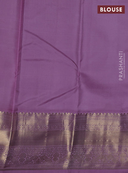 Pure kanchipuram silk saree green and lavender with zari woven buttas and zari woven korvai border