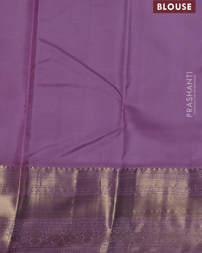 Pure kanchipuram silk saree green and lavender with zari woven buttas and zari woven korvai border