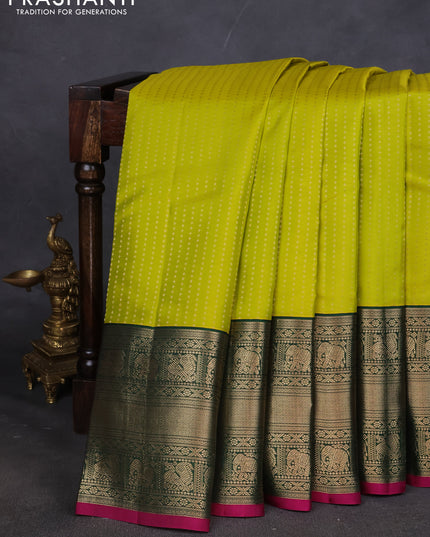Pure kanchipuram silk saree lime green and dark green with allover zari woven butta weaves and long zari woven korvai border