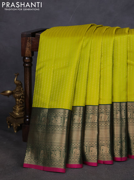 Pure kanchipuram silk saree lime green and dark green with allover zari woven butta weaves and long zari woven korvai border