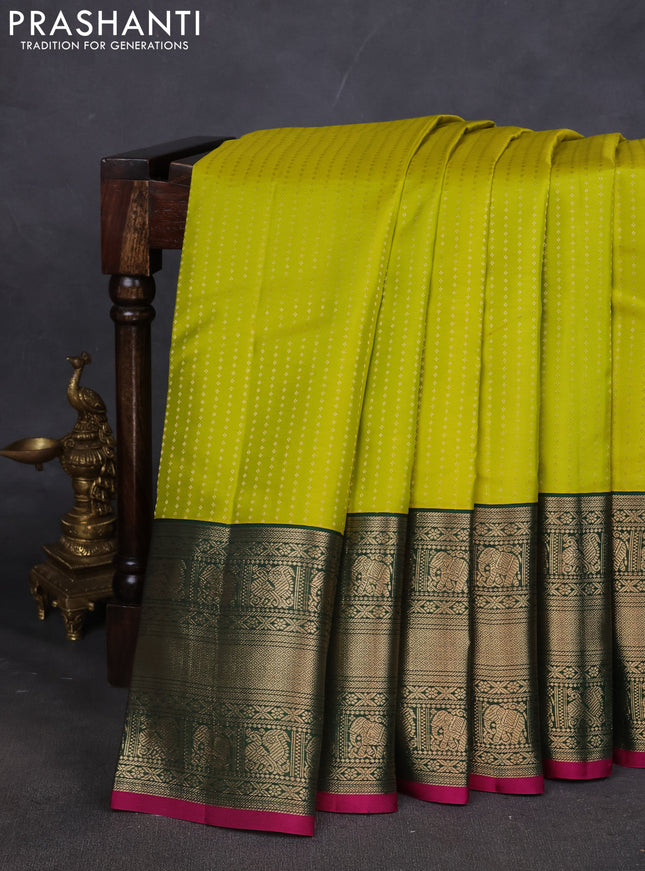 Pure kanchipuram silk saree lime green and dark green with allover zari woven butta weaves and long zari woven korvai border