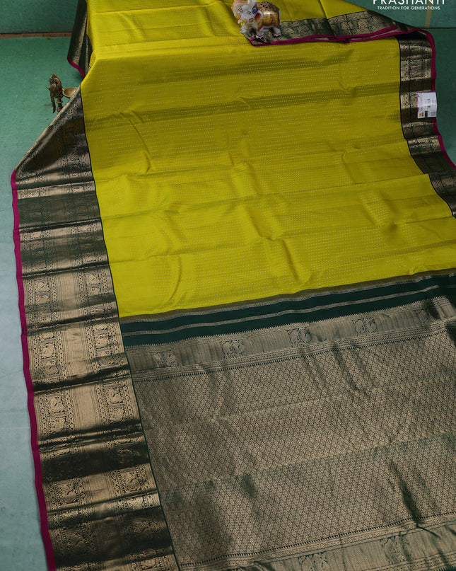 Pure kanchipuram silk saree lime green and dark green with allover zari woven butta weaves and long zari woven korvai border