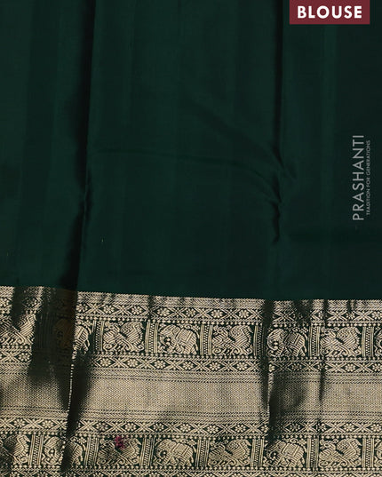 Pure kanchipuram silk saree yellow and dark green with allover zari woven butta weaves and long zari woven korvai border