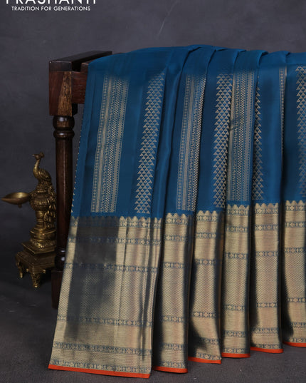 Pure kanchipuram silk saree peacock blue and orange with allover zari weaves and long zari woven border