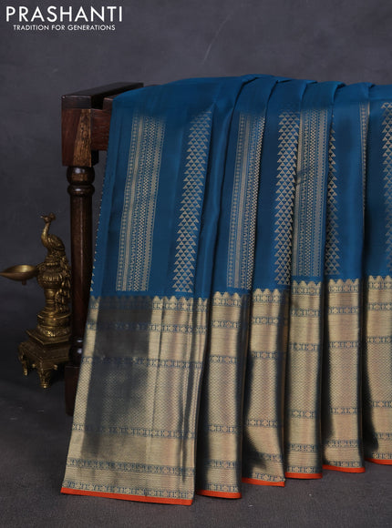 Pure kanchipuram silk saree peacock blue and orange with allover zari weaves and long zari woven border