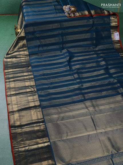 Pure kanchipuram silk saree peacock blue and orange with allover zari weaves and long zari woven border