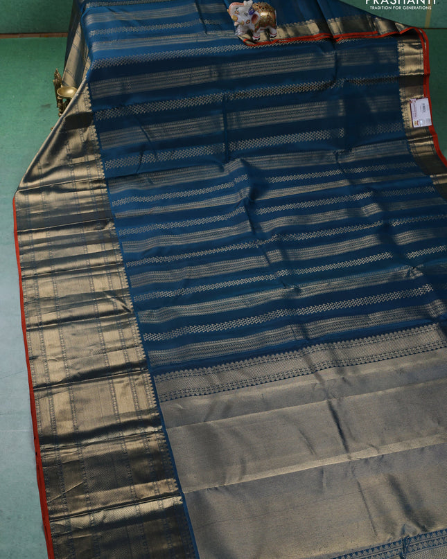 Pure kanchipuram silk saree peacock blue and orange with allover zari weaves and long zari woven border