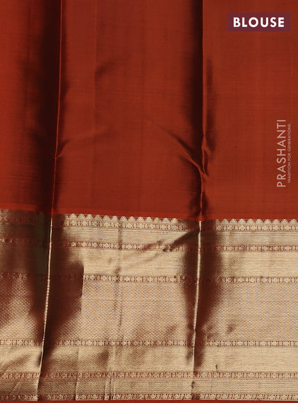 Pure kanchipuram silk saree peacock blue and orange with allover zari weaves and long zari woven border