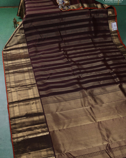 Pure kanchipuram silk saree brown and orange with allover zari weaves and long zari woven border