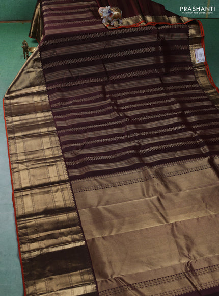 Pure kanchipuram silk saree brown and orange with allover zari weaves and long zari woven border