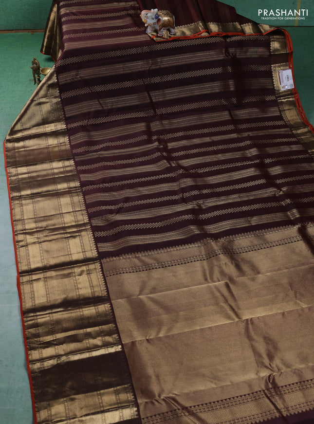 Pure kanchipuram silk saree brown and orange with allover zari weaves and long zari woven border