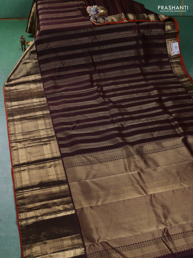 Pure kanchipuram silk saree brown and orange with allover zari weaves and long zari woven border