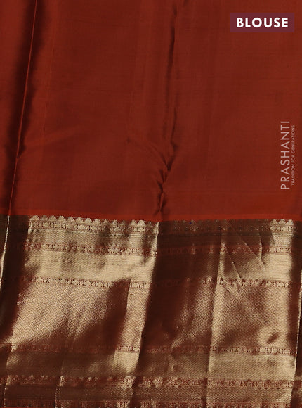Pure kanchipuram silk saree brown and orange with allover zari weaves and long zari woven border