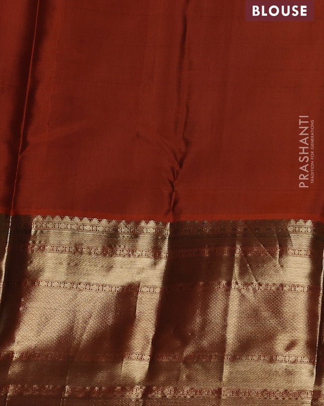 Pure kanchipuram silk saree brown and orange with allover zari weaves and long zari woven border