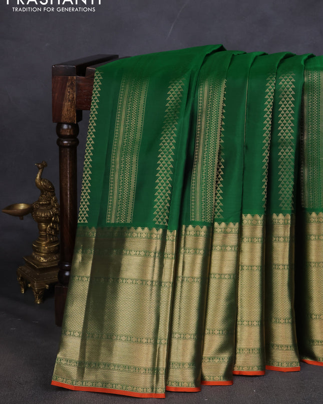 Pure kanchipuram silk saree green and orange with allover zari weaves and long zari woven border