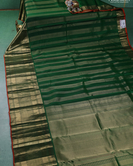 Pure kanchipuram silk saree green and orange with allover zari weaves and long zari woven border