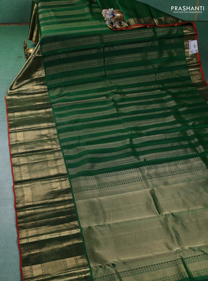 Pure kanchipuram silk saree green and orange with allover zari weaves and long zari woven border
