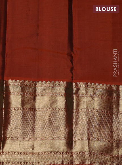 Pure kanchipuram silk saree green and orange with allover zari weaves and long zari woven border