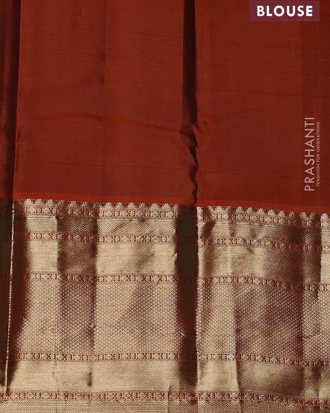 Pure kanchipuram silk saree green and orange with allover zari weaves and long zari woven border