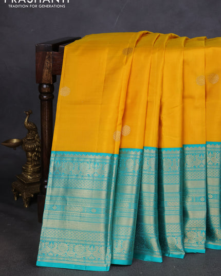 Pure kanchipuram silk saree lime yellow and teal blue with zari woven buttas and long zari woven korvai border