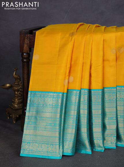 Pure kanchipuram silk saree lime yellow and teal blue with zari woven buttas and long zari woven korvai border