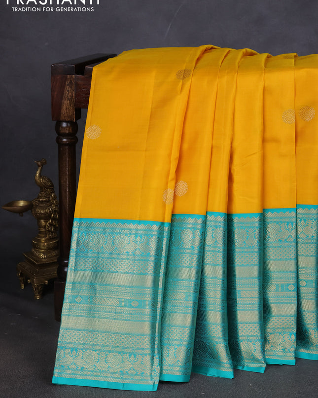 Pure kanchipuram silk saree lime yellow and teal blue with zari woven buttas and long zari woven korvai border
