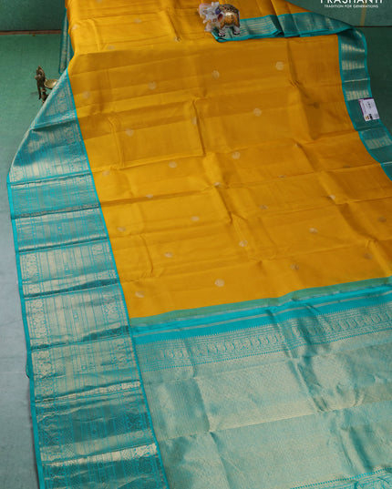 Pure kanchipuram silk saree lime yellow and teal blue with zari woven buttas and long zari woven korvai border