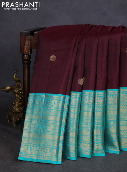 Pure kanchipuram silk saree deep maroon and teal blue with zari woven buttas and long zari woven korvai border