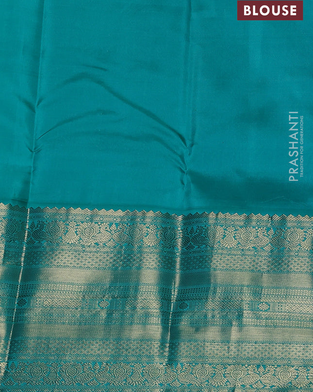Pure kanchipuram silk saree deep maroon and teal blue with zari woven buttas and long zari woven korvai border