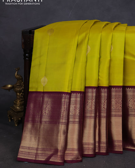 Pure kanchipuram silk saree lime yellow and wine shade with zari woven buttas and long zari woven korvai border