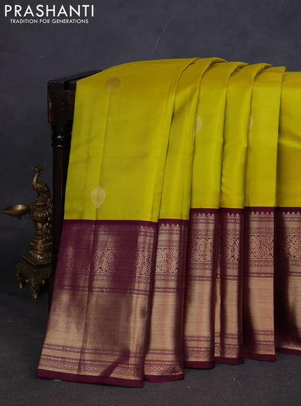 Pure kanchipuram silk saree lime yellow and wine shade with zari woven buttas and long zari woven korvai border