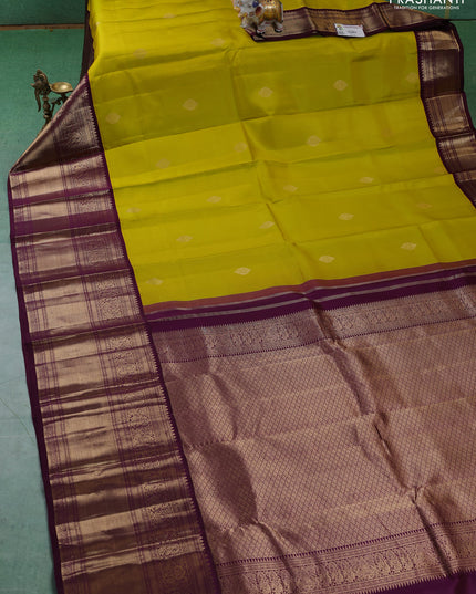 Pure kanchipuram silk saree lime yellow and wine shade with zari woven buttas and long zari woven korvai border