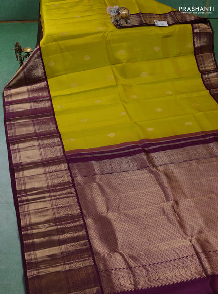 Pure kanchipuram silk saree lime yellow and wine shade with zari woven buttas and long zari woven korvai border