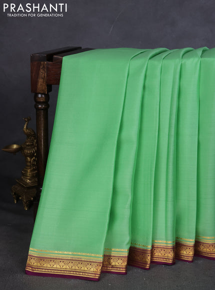 Pure mysore silk saree pastel green and wine shade with plain body and zari woven border