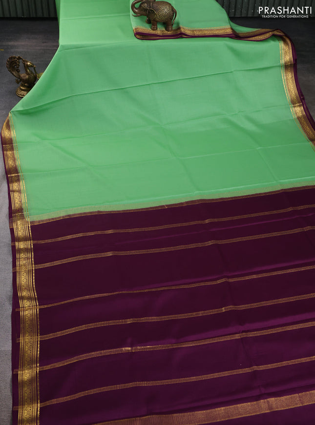 Pure mysore silk saree pastel green and wine shade with plain body and zari woven border