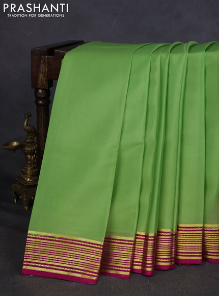 Pure mysore silk saree pista green and pink with plain body and zari woven border