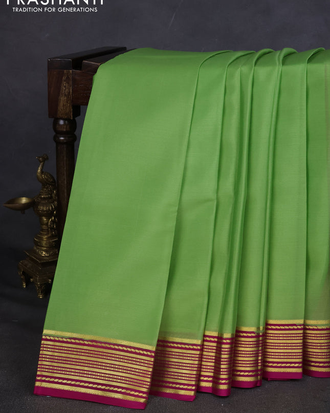 Pure mysore silk saree pista green and pink with plain body and zari woven border
