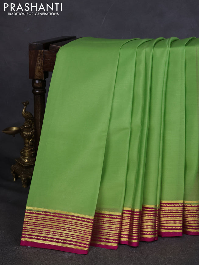 Pure mysore silk saree pista green and pink with plain body and zari woven border