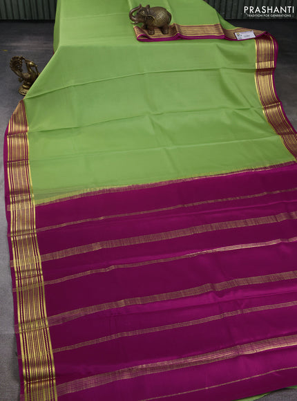 Pure mysore silk saree pista green and pink with plain body and zari woven border