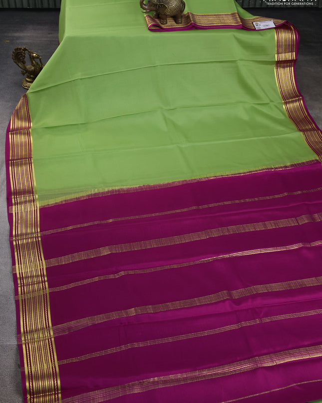 Pure mysore silk saree pista green and pink with plain body and zari woven border