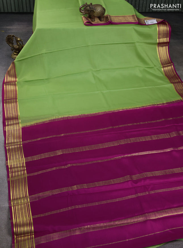 Pure mysore silk saree pista green and pink with plain body and zari woven border