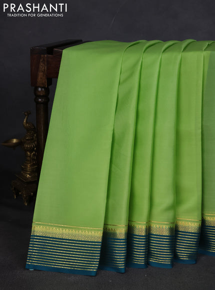 Pure mysore silk saree pista green and teal blue with plain body and zari woven border